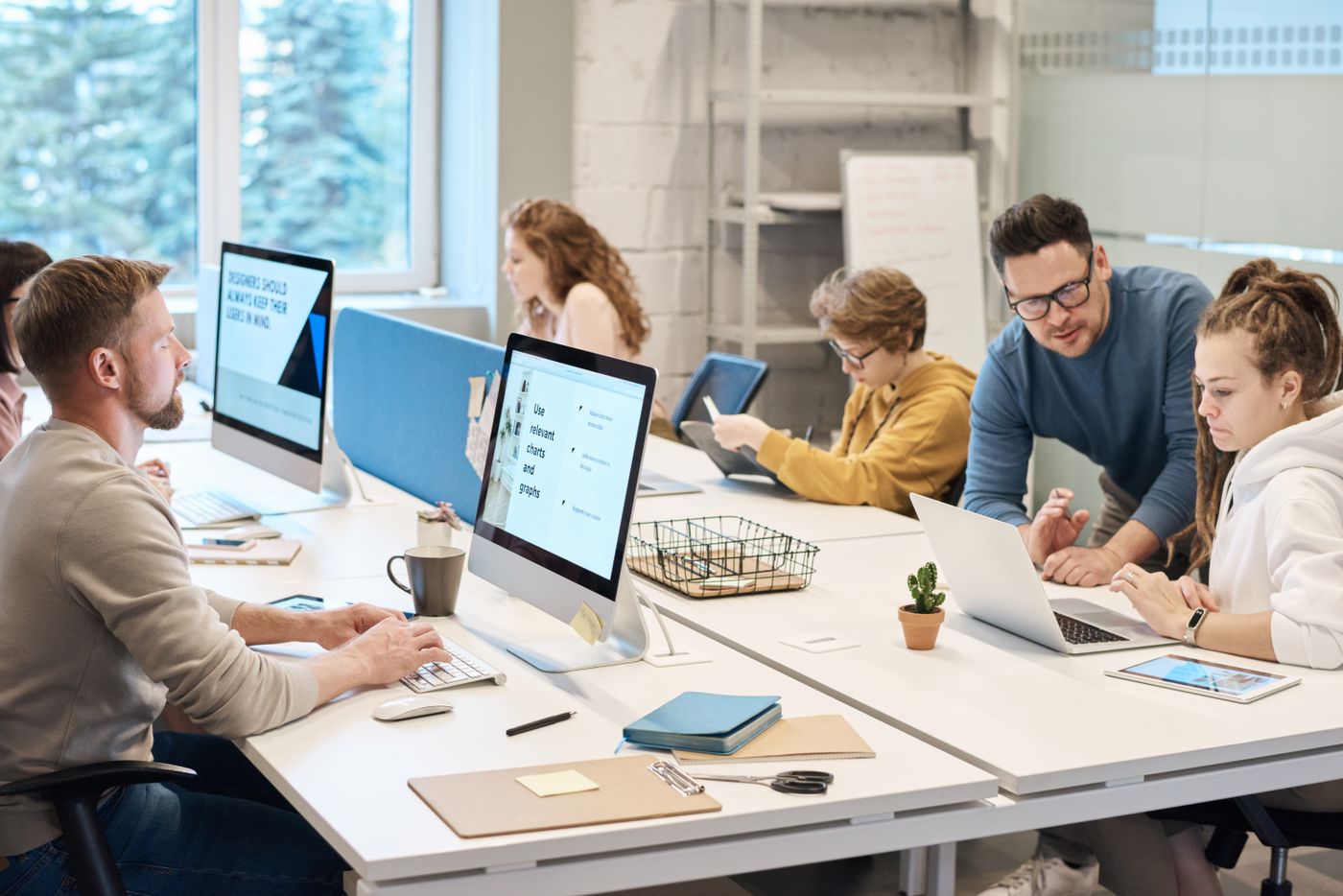 Local government staff working at computer workstations