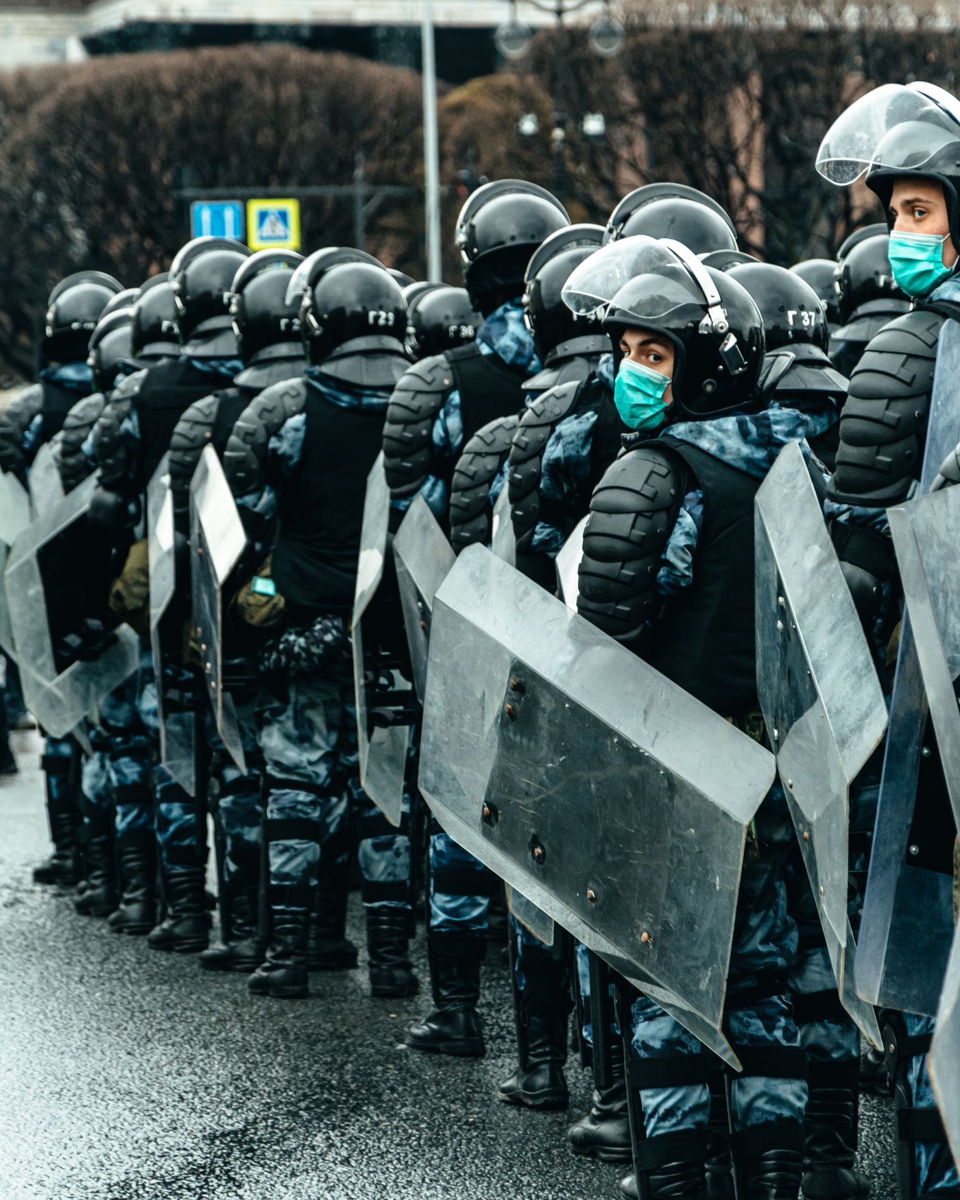 Police officers with protective riot shields